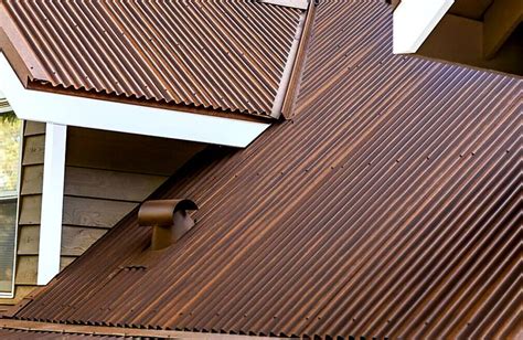 houses with rusty looking metal roofs|painting rusty galvanized metal roof.